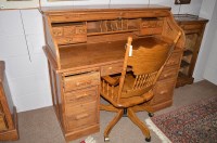 Lot 716 - A 'Country Collections' oak pedestal desk, the...