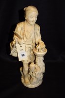 Lot 68 - A Meiji period carved ivory figure of a...