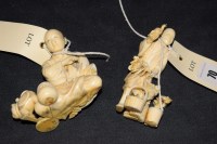 Lot 70 - Two Meiji period carved ivory groups: a flower...