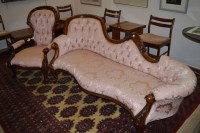 Lot 665 - A Victorian style carved mahogany chaise...