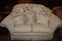 Lot 692 - A pair of sofas covered in floral pattern...