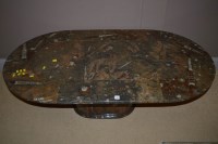 Lot 771 - A porphyry marble table with brass stringing...