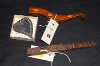 Lot 126 - An antique carved wooden knitting sheath; and...