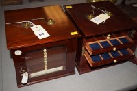 Lot 459 - A pair of table top coin cabinets, with glazed...