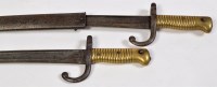 Lot 350 - Two 19th Century French sword bayonets for a...