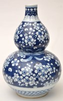 Lot 461 - A Chinese blue and white double gourd shaped...