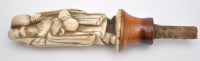 Lot 516 - Sino-Japanese bone stopper terminal of Liu Hai,...