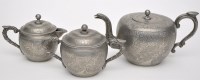 Lot 523 - Chinese pewter composite three-piece tea set,...