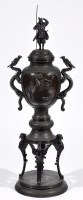 Lot 553 - A fine Meiji period patinated bronze...