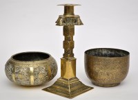 Lot 558 - Brass cruciform-shaped candlestick, probably...