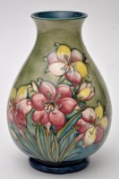 Lot 598 - Moorcroft 'Fresia' baluster vase, the...