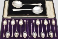 Lot 677 - A set of twelve George V teaspoons and...