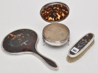 Lot 682 - A George V dressing table hand mirror, by...