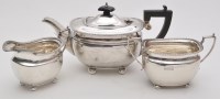 Lot 683 - A three-piece George VI tea service, by...