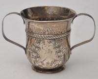 Lot 715 - A white metal two-handled porringer, with...