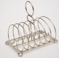 Lot 725 - An Edwardian seven bar toast rack, by George...