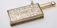 Lot 748 - A Continental enamelled 14K spark striker,...