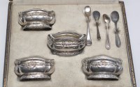 Lot 775 - A set of four French silver table salts,...