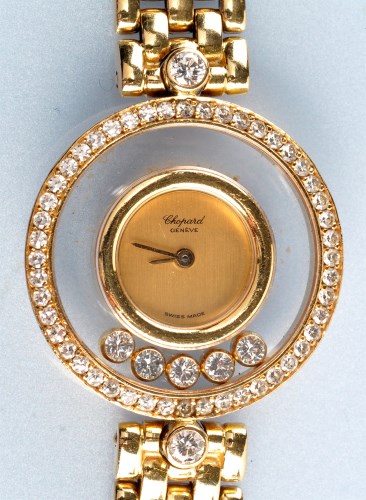 Lot 795 - Chopard: a lady's 'Happy Diamonds Wristwatch',...