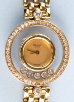 Lot 795 - Chopard: a lady's 'Happy Diamonds Wristwatch',...