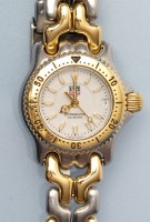 Lot 818 - Tag Heuer: a lady's stainless steel wristwatch,...