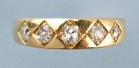 Lot 843 - A five stone diamond ring, the old cut...