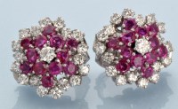 Lot 865 - A pair of ruby and diamond earrings, by...