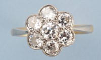 Lot 871 - A diamond cluster ring, set with seven...