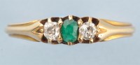 Lot 875 - An emerald and diamond ring, the central oval...