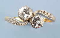 Lot 877 - A diamond ring, the two brilliant cut diamonds...