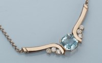 Lot 879 - A blue topaz and diamond necklace, the canted...