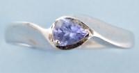 Lot 881 - A tanzanite ring, the pear cut tanzanite...