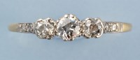 Lot 888 - A diamond ring, the three brilliant cut...