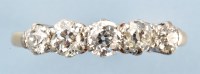 Lot 889 - A five stone diamond ring, the old cut...