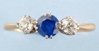 Lot 892 - A sapphire and diamond ring, the circular...