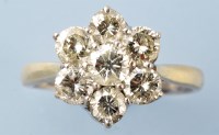 Lot 914 - A diamond cluster ring, set with seven...