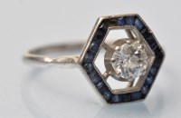 Lot 935 - An Art Deco sapphire and diamond ring, the...