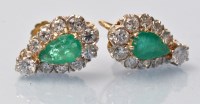 Lot 936 - A pair of emerald and diamond earrings, of...