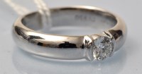 Lot 937 - A Tiffany solitaire diamond ring, the...