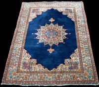 Lot 953 - A central Persian rug, with rosette to blue...