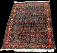 Lot 954 - A Hamadan rug, with small flowerhead design,...