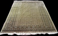 Lot 958 - An Bokhara carpet, with medallions and...