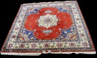 Lot 966 - A Tabriz carpet, the central rosette within...