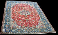 Lot 977 - An Isfahan carpet, with central rosette...