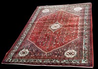 Lot 978 - An Abadeh carpet, with flowerheads to red...