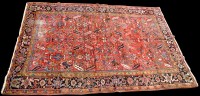 Lot 981 - A Heriz carpet, with geometric flower and leaf...