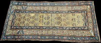 Lot 982 - A small Kurdish runner, with boteh decoration...