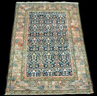 Lot 986 - A Farahan rug, with floral decoration to field,...