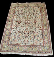 Lot 989 - A Bidjar rug, scrolling leaf design on ivory...