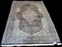 Lot 992 - A Tabriz carpet, with shaped floral decorated...